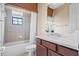 Bathroom with a shower-tub combo and updated vanity at 20314 Chestnut Grove Dr, Tampa, FL 33647