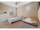Bright bedroom featuring carpet floors, natural light, and a desk for work from home at 20314 Chestnut Grove Dr, Tampa, FL 33647