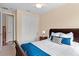 Cozy bedroom with a ceiling fan and closet at 20314 Chestnut Grove Dr, Tampa, FL 33647