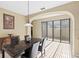 Dining room with tile floors and large window at 20314 Chestnut Grove Dr, Tampa, FL 33647