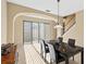 Dining room featuring tile floor and sliding glass door at 20314 Chestnut Grove Dr, Tampa, FL 33647