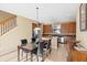 Cozy eat-in kitchen featuring stainless steel appliances and granite countertops at 20314 Chestnut Grove Dr, Tampa, FL 33647