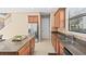 An open kitchen with stainless steel appliances and ample counter space at 20314 Chestnut Grove Dr, Tampa, FL 33647