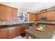 Bright kitchen features ample cabinetry, sleek countertops, and stainless steel appliances at 20314 Chestnut Grove Dr, Tampa, FL 33647