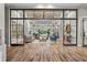 Elegantly decorated lounge area featuring modern furniture, stylish decor, and abundant natural light at 20314 Chestnut Grove Dr, Tampa, FL 33647