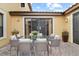 Outdoor patio with a table and seating, perfect for entertaining at 20314 Chestnut Grove Dr, Tampa, FL 33647