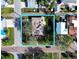 Aerial view of property with defined border, showcasing surrounding yards and street access at 3102 57Th S St, Gulfport, FL 33707