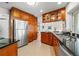Spacious kitchen with granite countertops and wooden cabinets at 7233 15Th Ne Ct, St Petersburg, FL 33702