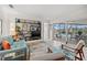 Comfortable living room with stylish furnishings and a view of the pool area at 7233 15Th Ne Ct, St Petersburg, FL 33702