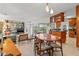 Open-concept living area with views of the kitchen and pool at 7233 15Th Ne Ct, St Petersburg, FL 33702
