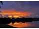 Beautiful sunset with colorful orange and purple hues reflected in the water at 7233 15Th Ne Ct, St Petersburg, FL 33702