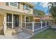 Inviting front porch featuring a cozy seating area, stylish railing, and a welcoming entrance at 13945 75Th Ave, Seminole, FL 33776