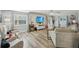 Open living area with wood floors, recessed lighting, comfortable seating and backyard views at 13945 75Th Ave, Seminole, FL 33776
