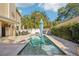 Backyard pool and patio area with a view of the house, landscaping, and outdoor seating at 13945 75Th Ave, Seminole, FL 33776