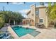 Inviting backyard pool with patio area and outdoor seating, perfect for relaxation and entertainment at 13945 75Th Ave, Seminole, FL 33776