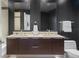 Modern bathroom featuring a double vanity with sleek cabinets and minimalist fixtures at 175 1St S St # 3402, St Petersburg, FL 33701