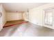 Bonus room with white walls, a drop ceiling and door to the exterior at 262 Pryor St, Brooksville, FL 34601