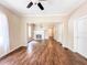 Bright living room with elegant trim, wood flooring, and cozy fireplace at 262 Pryor St, Brooksville, FL 34601