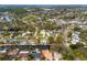 Aerial view of canal-front home and the neighborhood at 5321 Dover Ne St, St Petersburg, FL 33703