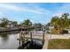 Waterfront home featuring a private dock on a serene canal at 5321 Dover Ne St, St Petersburg, FL 33703