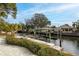 Scenic view of a private boat dock and canal access near a residential home at 5321 Dover Ne St, St Petersburg, FL 33703