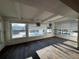 Sun room features views of the pool and backyard, along with stylish lighting at 5321 Dover Ne St, St Petersburg, FL 33703