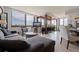 Inviting living room featuring large windows, stylish furnishings, and an open layout for relaxation at 6104 Palma Del Mar S Blvd # 404, St Petersburg, FL 33715
