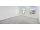 Cozy bedroom featuring carpet and bright windows at 6233 Golden Beach Dr, Apollo Beach, FL 33572