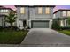 Charming home with well-maintained landscaping and a two-car garage at 6233 Golden Beach Dr, Apollo Beach, FL 33572