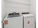 Laundry room with new Whirlpool washer and dryer at 6233 Golden Beach Dr, Apollo Beach, FL 33572