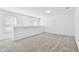 Spacious living room with carpet and bright windows at 6233 Golden Beach Dr, Apollo Beach, FL 33572