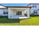 Covered patio with concrete flooring and sliding glass doors at 6233 Golden Beach Dr, Apollo Beach, FL 33572