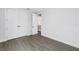 This bedroom offers ample closet space and a view through an open doorway at 2246 Fiesta Dr, Sarasota, FL 34231
