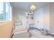 Charming bedroom with whimsical unicorn decor and plush rug at 2246 Fiesta Dr, Sarasota, FL 34231