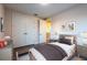 Bedroom featuring neutral tones, a twin bed, closet, and natural lighting at 2246 Fiesta Dr, Sarasota, FL 34231