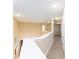 Upstairs hallway featuring railing and architectural details at 2246 Fiesta Dr, Sarasota, FL 34231