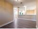 Hallway with tile floors, white trim, and beige walls at 2246 Fiesta Dr, Sarasota, FL 34231