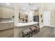 Kitchen with breakfast bar, modern cabinetry, and stainless steel appliances at 2246 Fiesta Dr, Sarasota, FL 34231