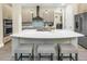 Well-equipped kitchen with modern appliances and a large island at 2246 Fiesta Dr, Sarasota, FL 34231