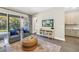 Comfortable living room with modern decor and access to the outdoor patio at 2246 Fiesta Dr, Sarasota, FL 34231