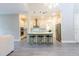 Bright and airy open floor plan featuring a modern kitchen with stainless steel appliances and barstool seating at 2246 Fiesta Dr, Sarasota, FL 34231