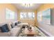 Comfortable living room with stylish decor, a plush sofa, and natural light at 2246 Fiesta Dr, Sarasota, FL 34231