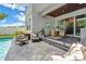 Outdoor patio with pool and seating area at 2246 Fiesta Dr, Sarasota, FL 34231