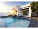 Modern backyard pool and patio area with sleek design, and a lounge area at 2246 Fiesta Dr, Sarasota, FL 34231
