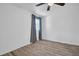 A simple, light-filled bedroom with hardwood floors and a small window at 2514 Ohio S Ct, Gulfport, FL 33707