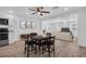 Bright dining room area open to a modern kitchen and spacious living area with plenty of natural light at 2514 Ohio S Ct, Gulfport, FL 33707