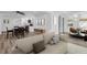 Inviting living room featuring hardwood floors and open concept access to a modern kitchen and dining area at 2514 Ohio S Ct, Gulfport, FL 33707
