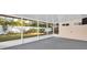 Sunroom featuring screened windows with views of the beautiful backyard at 2514 Ohio S Ct, Gulfport, FL 33707