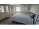 Comfortable bedroom with bright natural light and a spacious closet for storage at 27466 Us Highway 19 N # 97, Clearwater, FL 33761