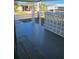 Concrete-floored porch with lattice work and a view of neighborhood street at 27466 Us Highway 19 N # 97, Clearwater, FL 33761